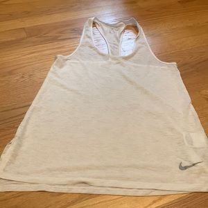 Nike. White think material. Size small.